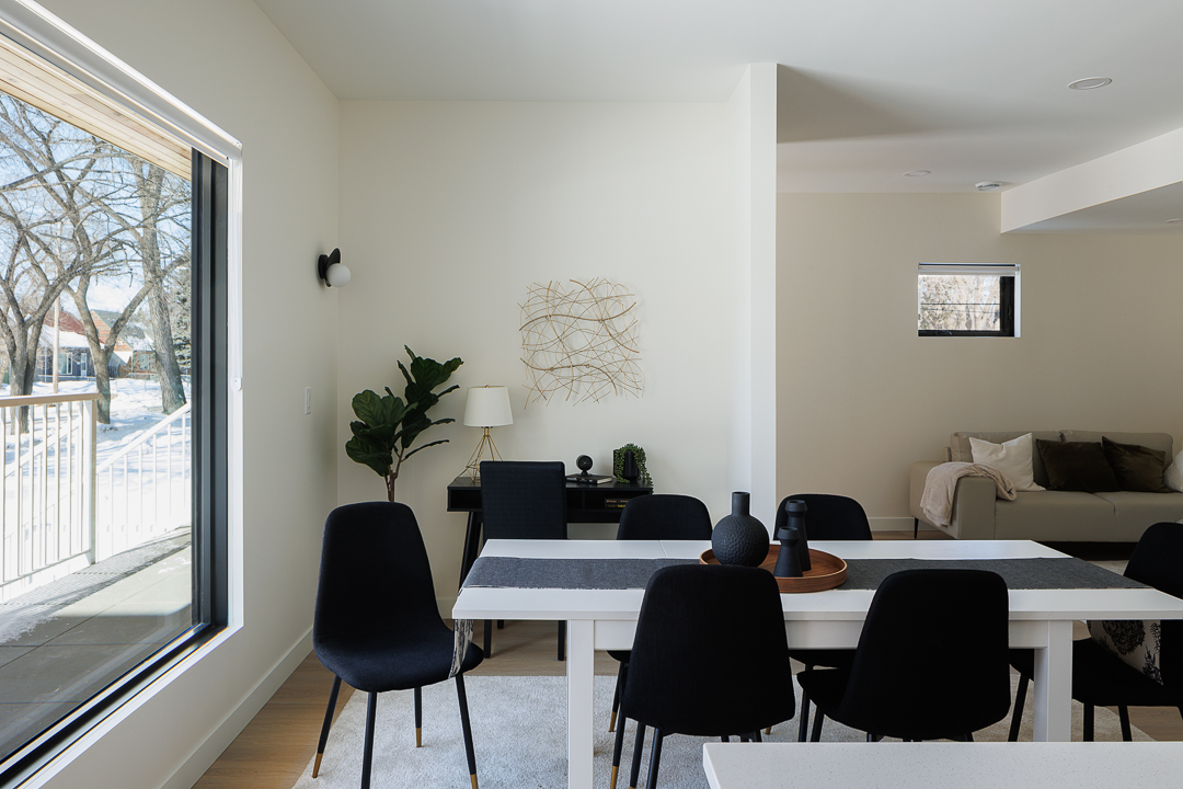 Dining area with tall window and street view